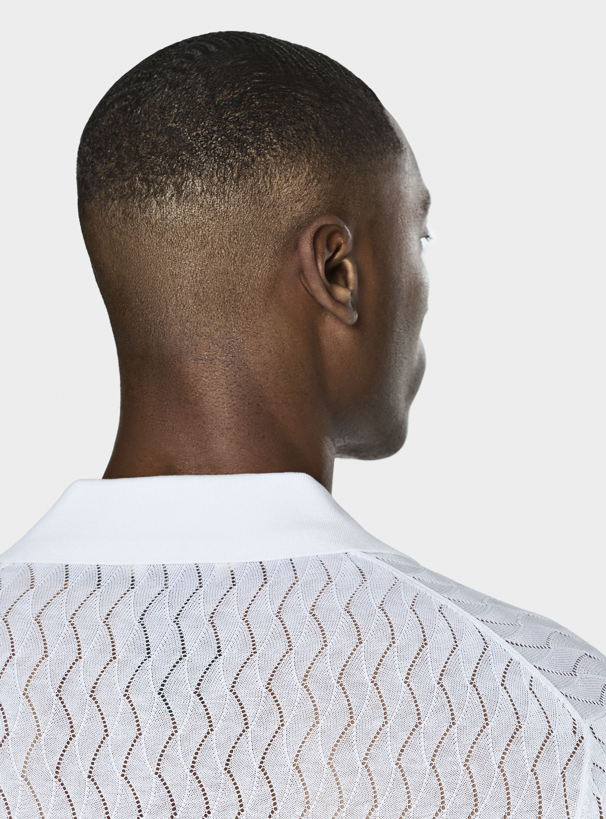 Polo de punto perforado de algod&oacute;n y seda, BLANCO